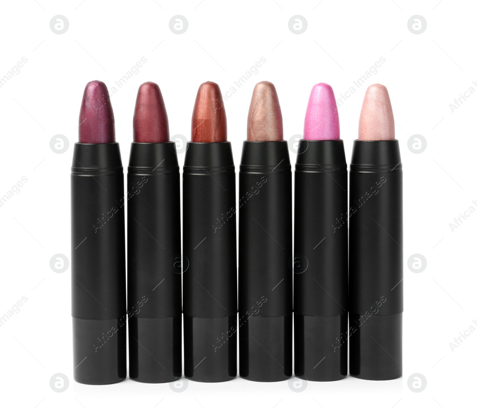 Photo of Set of colorful lipsticks isolated on white