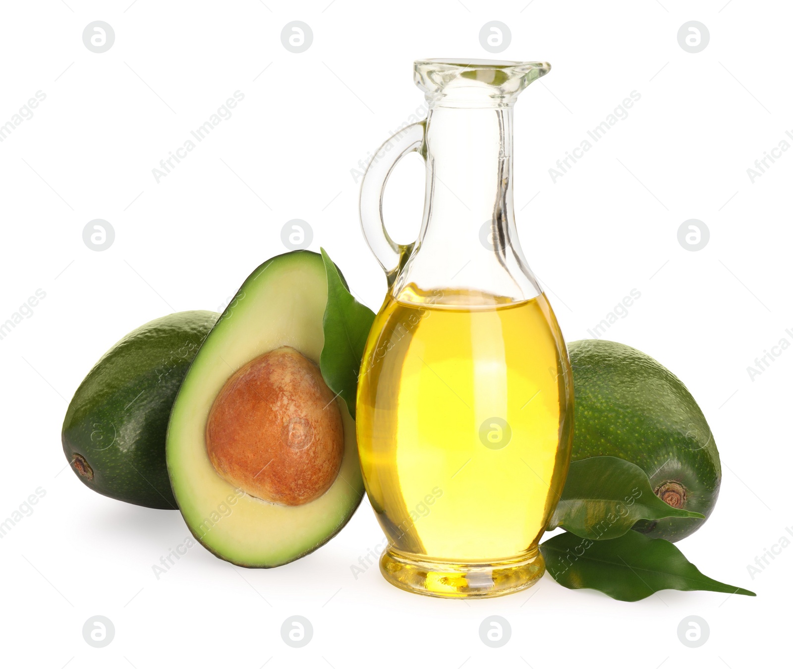 Photo of Cooking oil and fresh avocados isolated on white