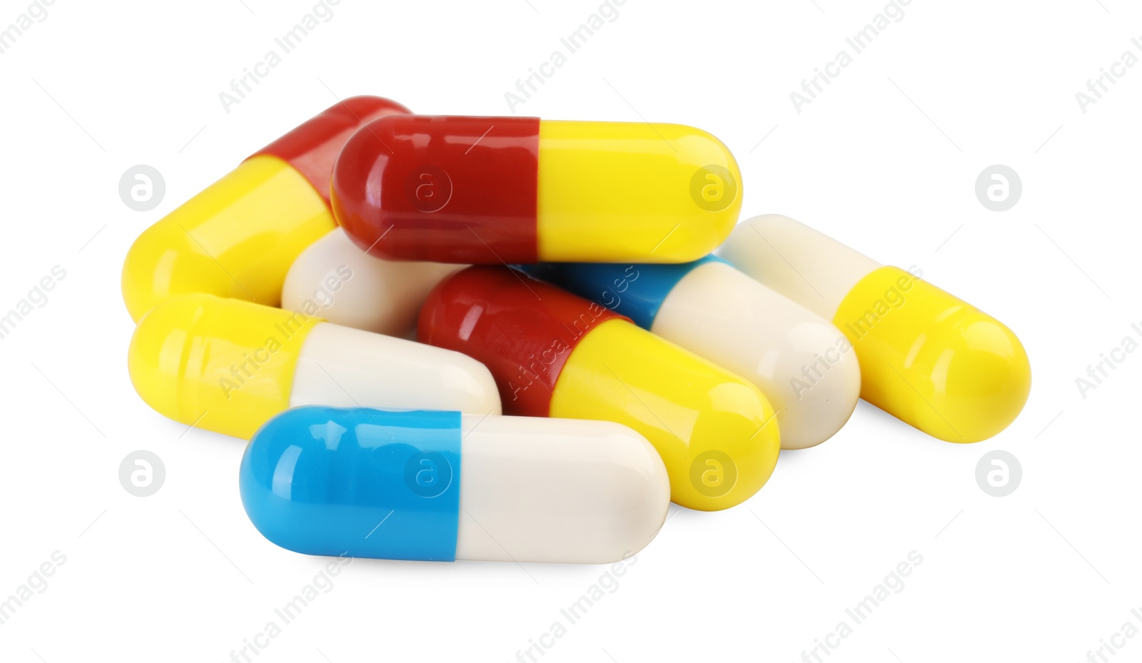 Photo of Many antibiotic pills isolated on white. Medicinal treatment