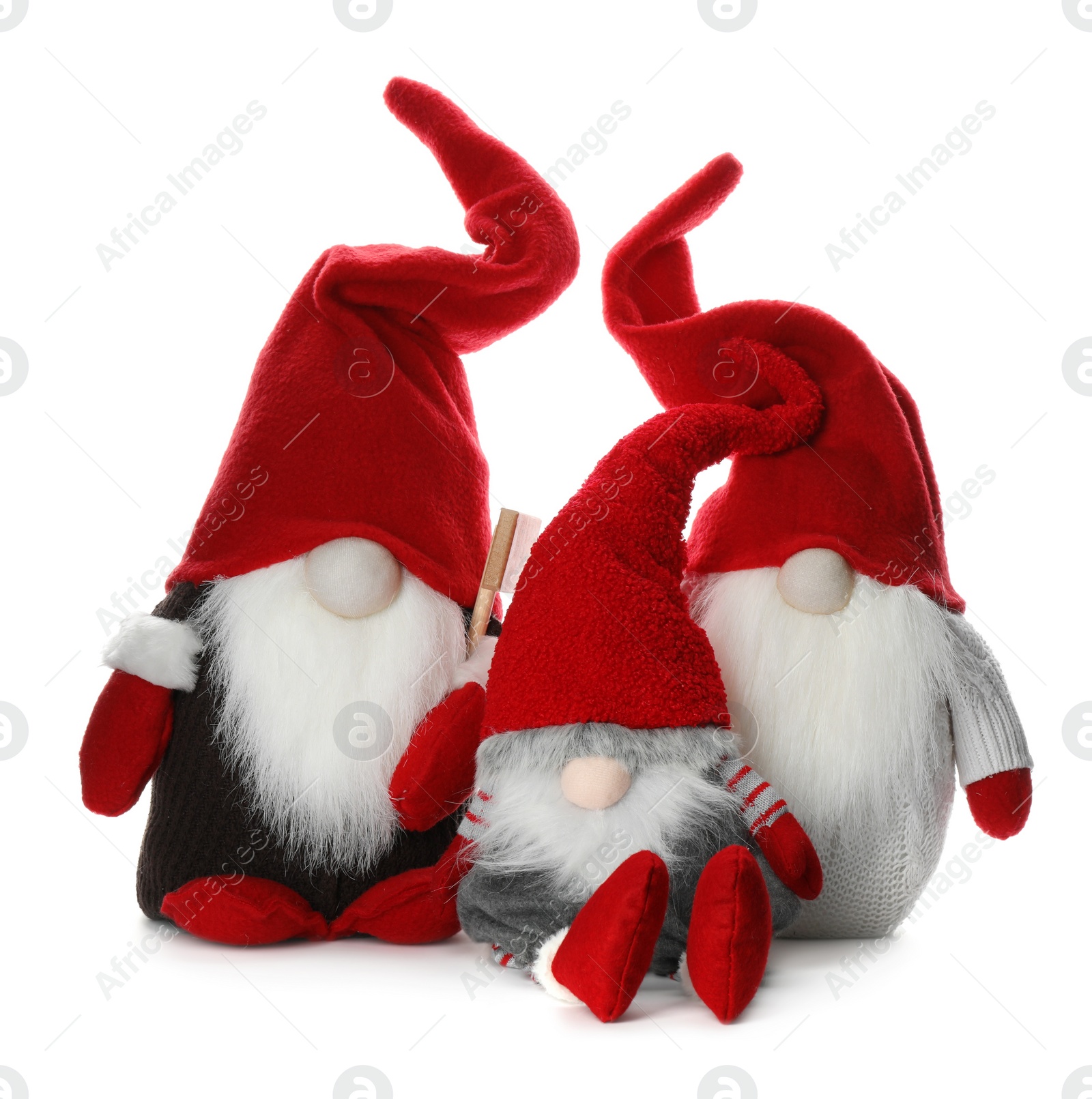 Photo of Funny Christmas gnomes on white background. Festive decor