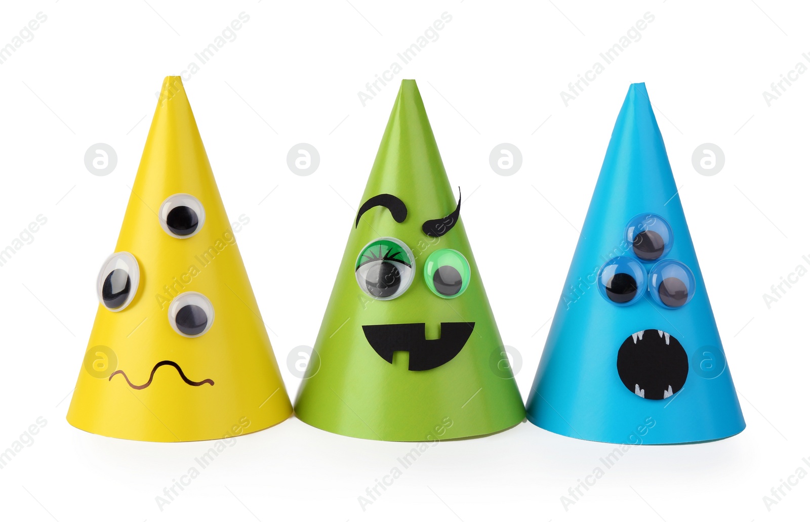 Photo of Funny handmade monsters isolated on white. Halloween decoration