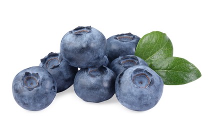 Photo of Pile of fresh ripe blueberries and leaves isolated on white