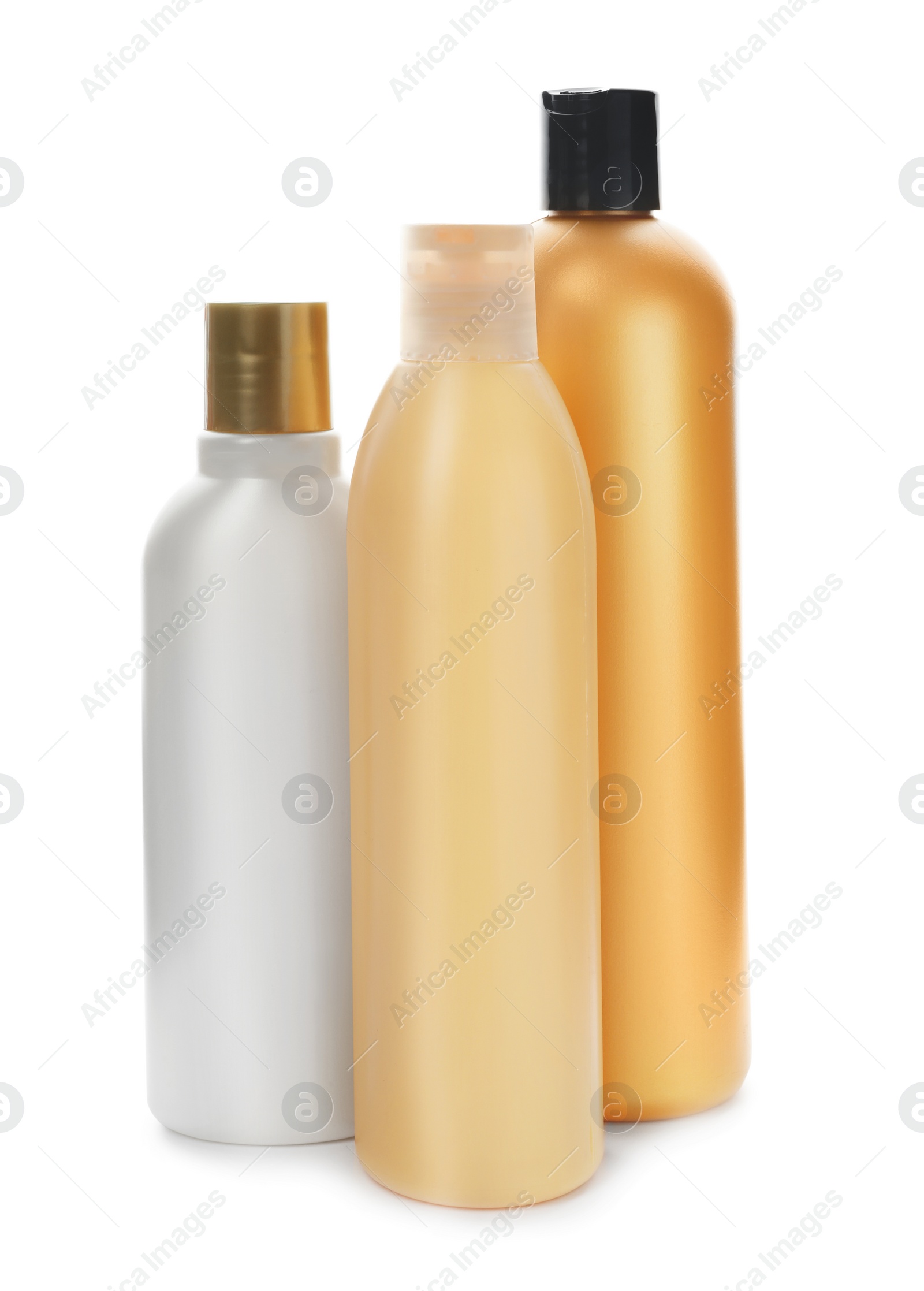 Photo of Bottles with cosmetic products on white background. Mockup for design