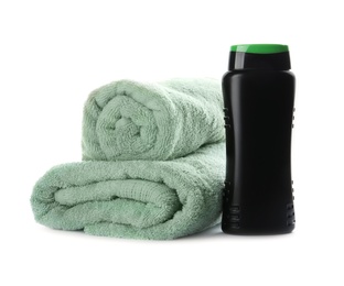 Photo of Personal hygiene product and towels on white background