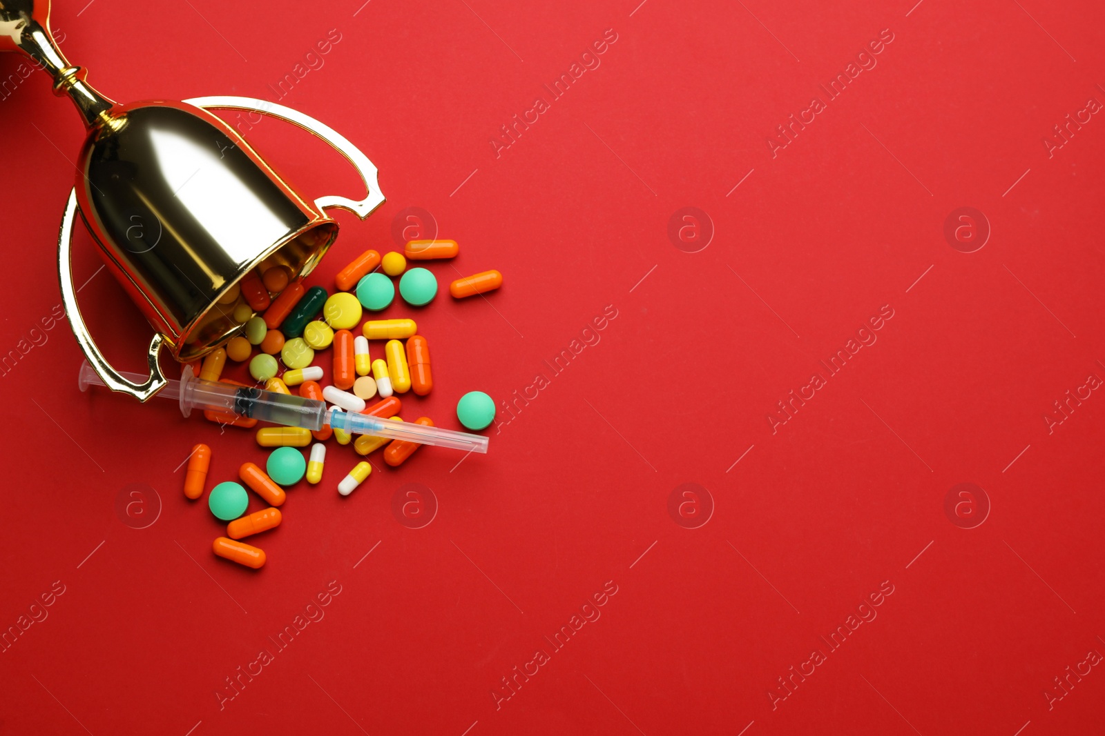 Photo of Flat lay composition with drugs on red background, space for text. Doping control