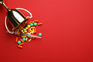 Photo of Flat lay composition with drugs on red background, space for text. Doping control