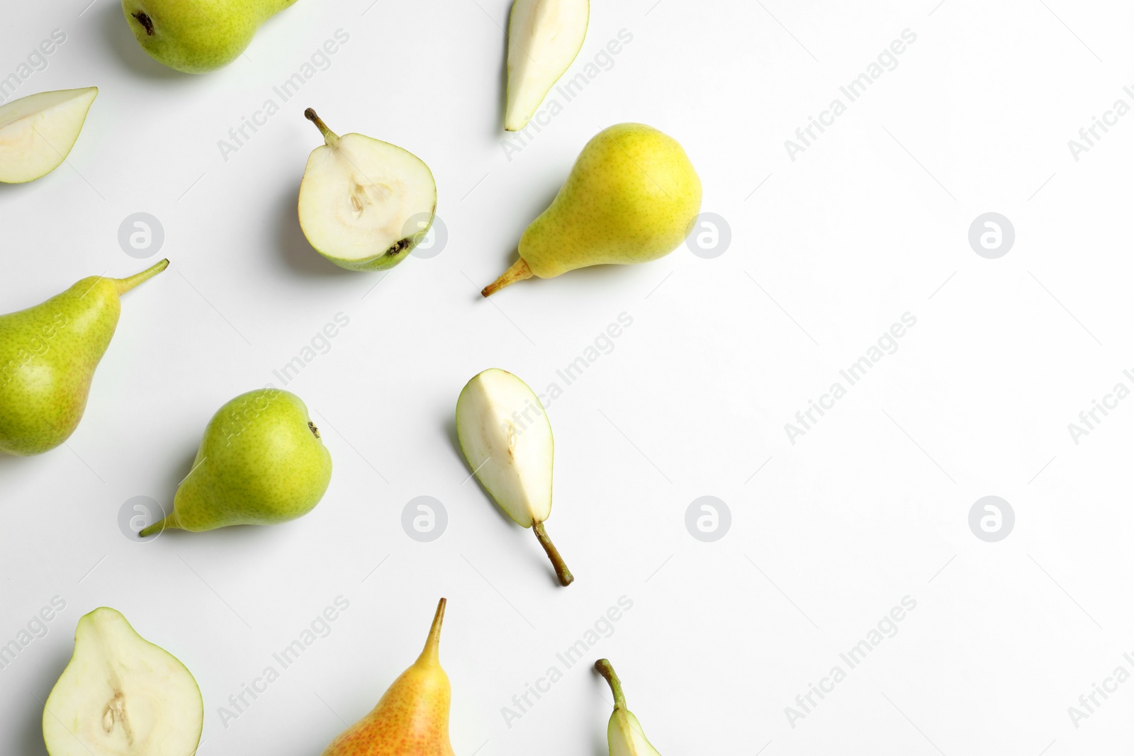 Photo of Fresh pears on light background, flat lay composition