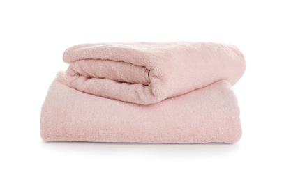 Photo of Folded clean soft towels on white background