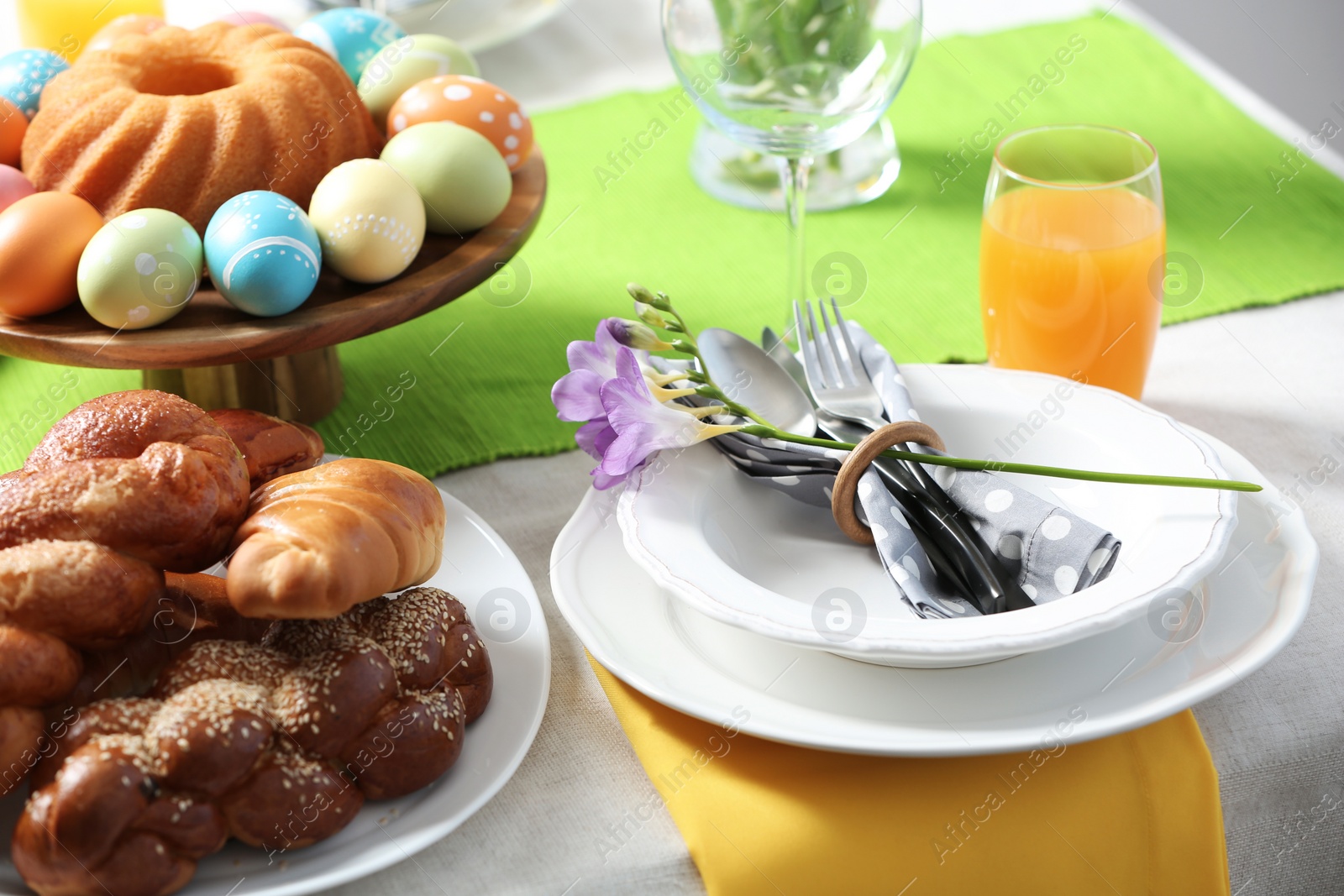 Photo of Festive Easter table setting with traditional meal