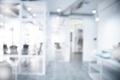 Image of Office interior. Blurred view of comfortable workspace