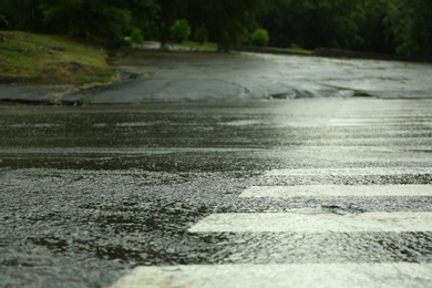 View of pedestrian crossing on rainy day