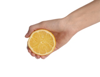 Photo of Woman holding fresh juicy half lemon isolated on white, closeup