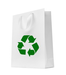 Paper shopping bag with recycling symbol on white background 