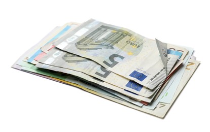 Image of Pile of different Euro banknotes on white background