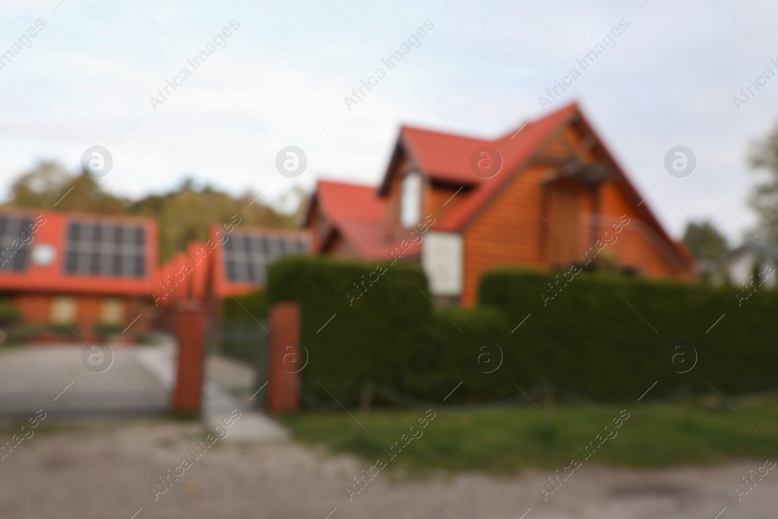 Photo of Beautiful houses outdoors, blurred view. Real estate for rent