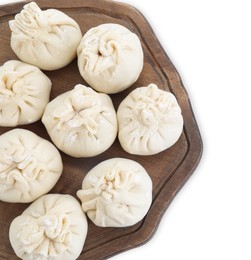 Board with uncooked khinkali (dumplings) isolated on white, top view. Georgian cuisine