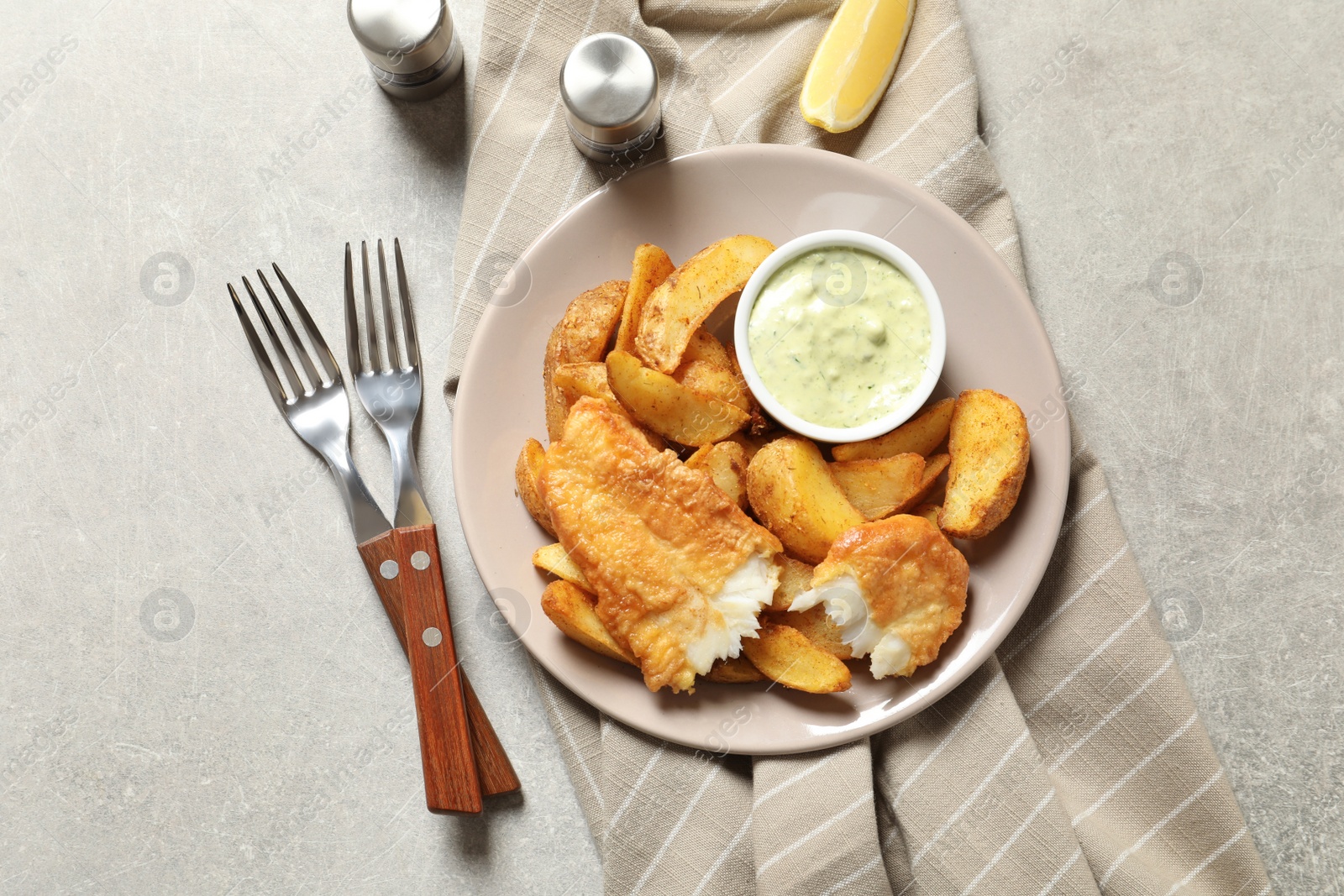 Photo of Plate with British Traditional Fish and potato chips on grey background, flat lay