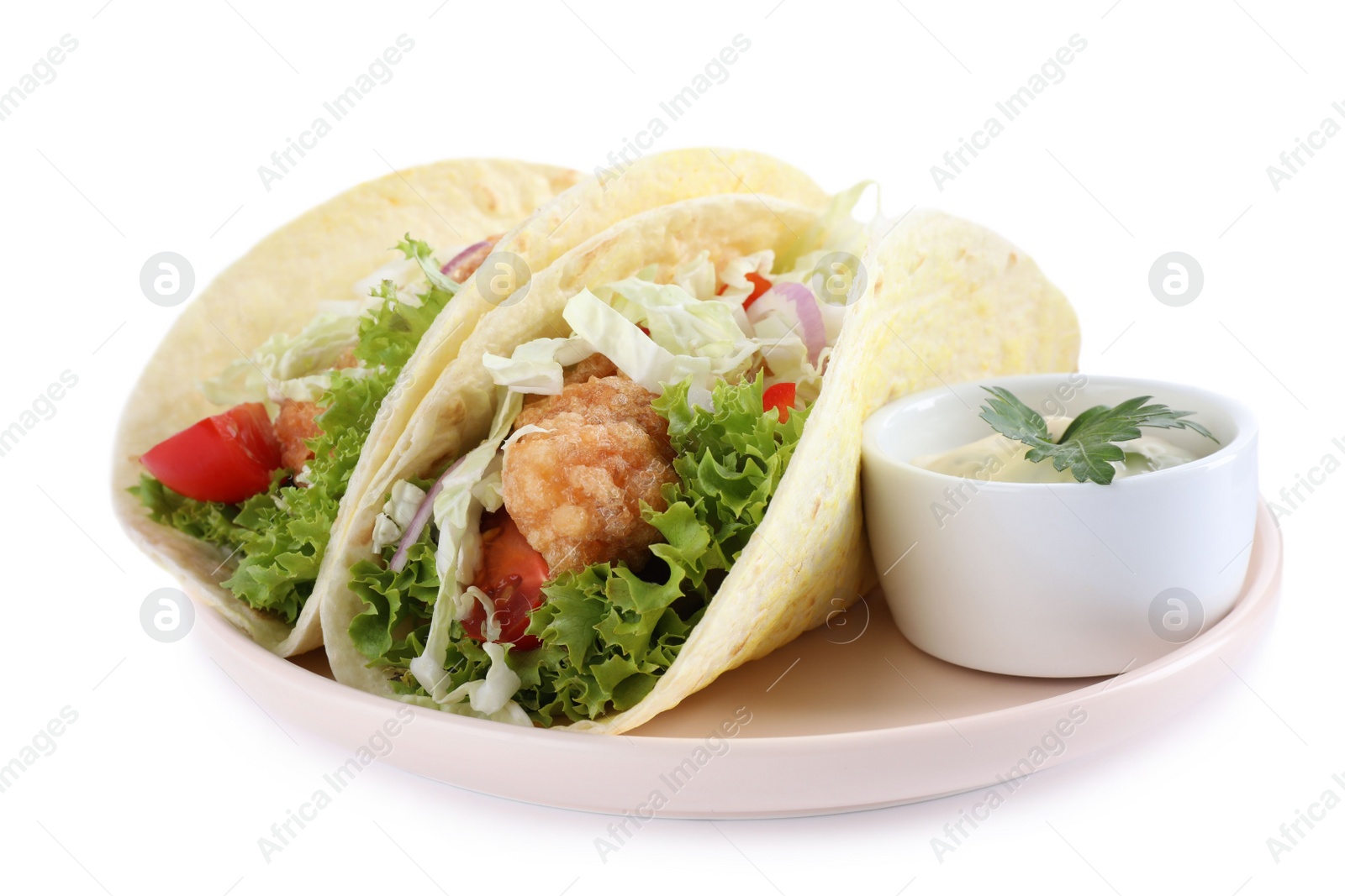 Photo of Yummy fish tacos with sauce isolated on white