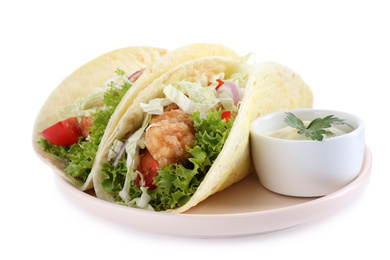 Yummy fish tacos with sauce isolated on white