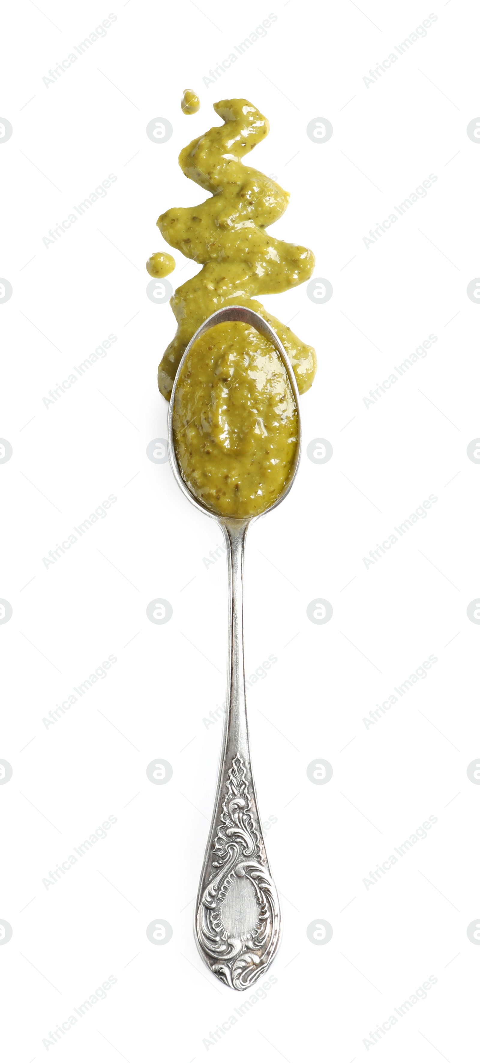 Photo of Delicious pesto sauce and spoon on white background, top view