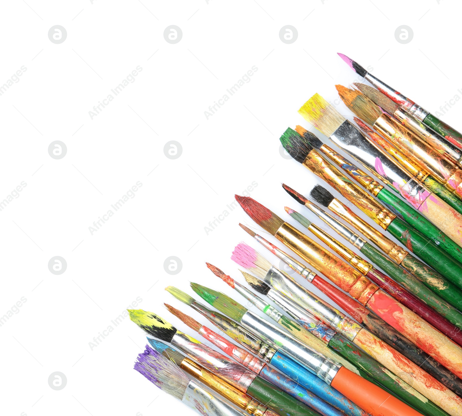 Photo of Different paint brushes on white background, top view