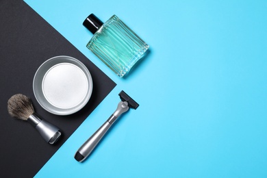 Set of shaving tools and perfume on color background, flat lay. Space for text