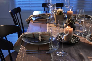 Festive table setting with beautiful tableware and decor indoors