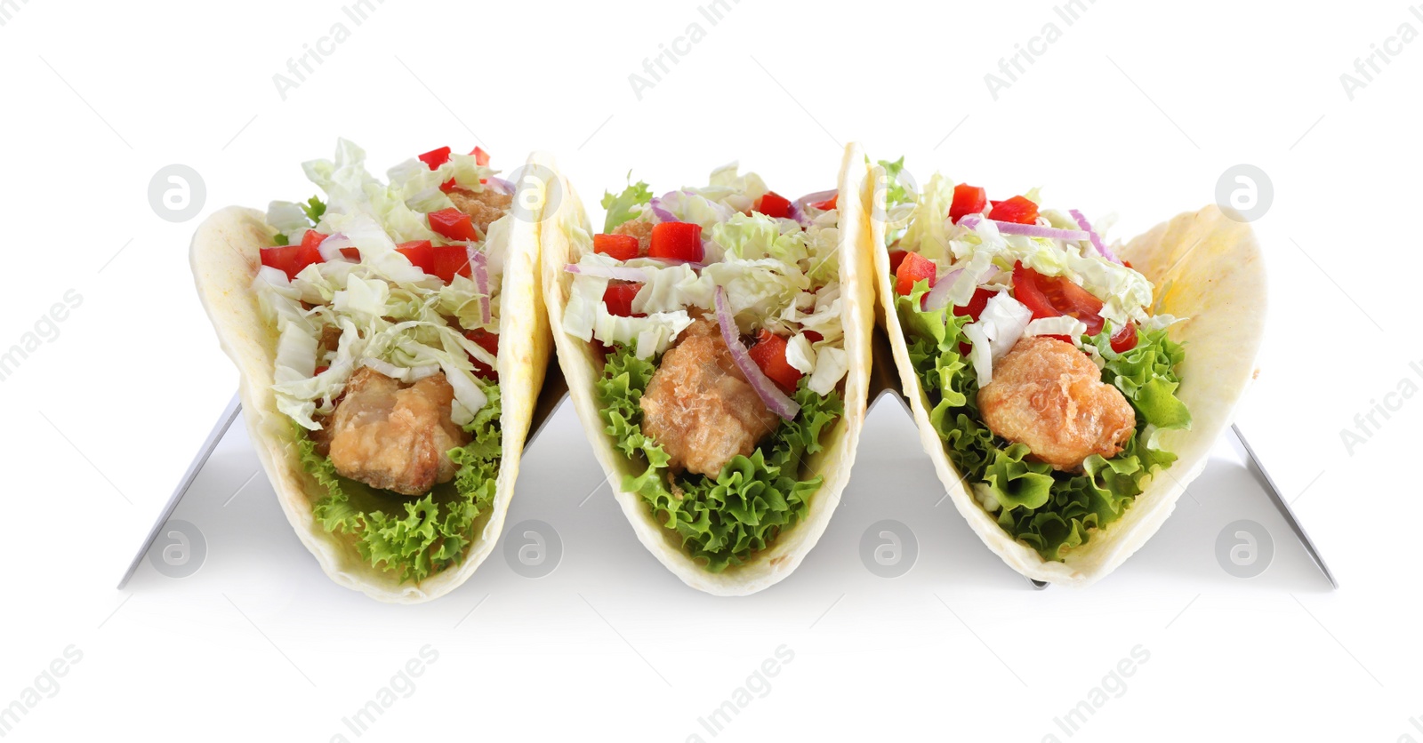 Photo of Yummy fish tacos in holder isolated on white