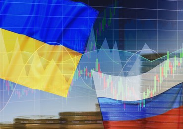 Image of Multiple exposure of Ukrainian, Russian flags, coins and digital stock exchange market charts