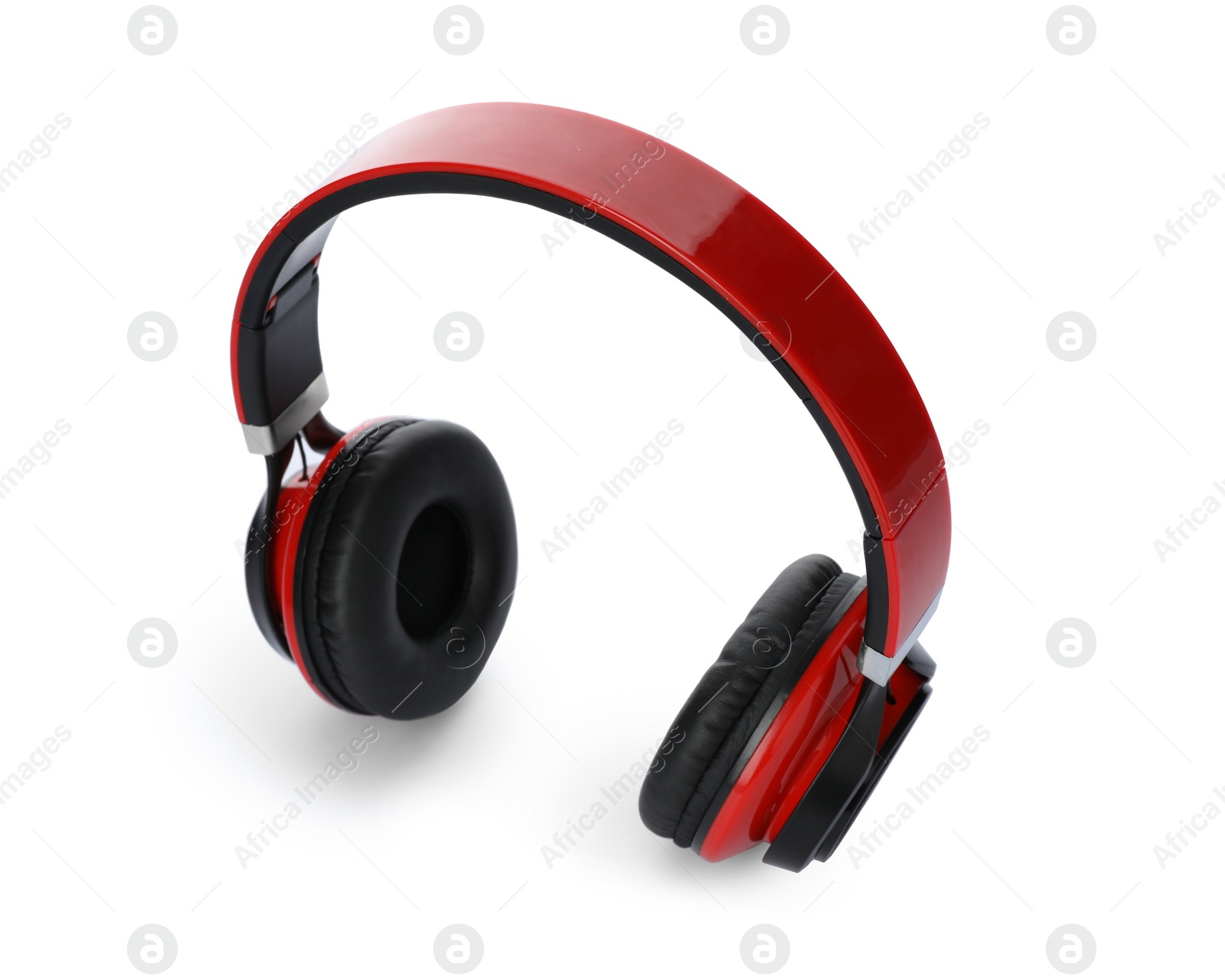 Photo of Stylish modern headphones with earmuffs on white background