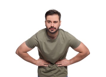 Photo of Man suffering from stomach pain on white background