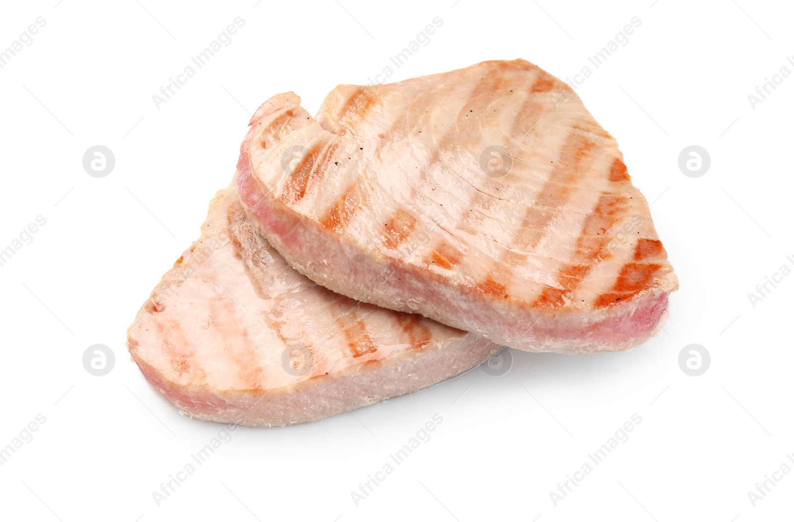 Photo of Delicious grilled tuna steaks isolated on white