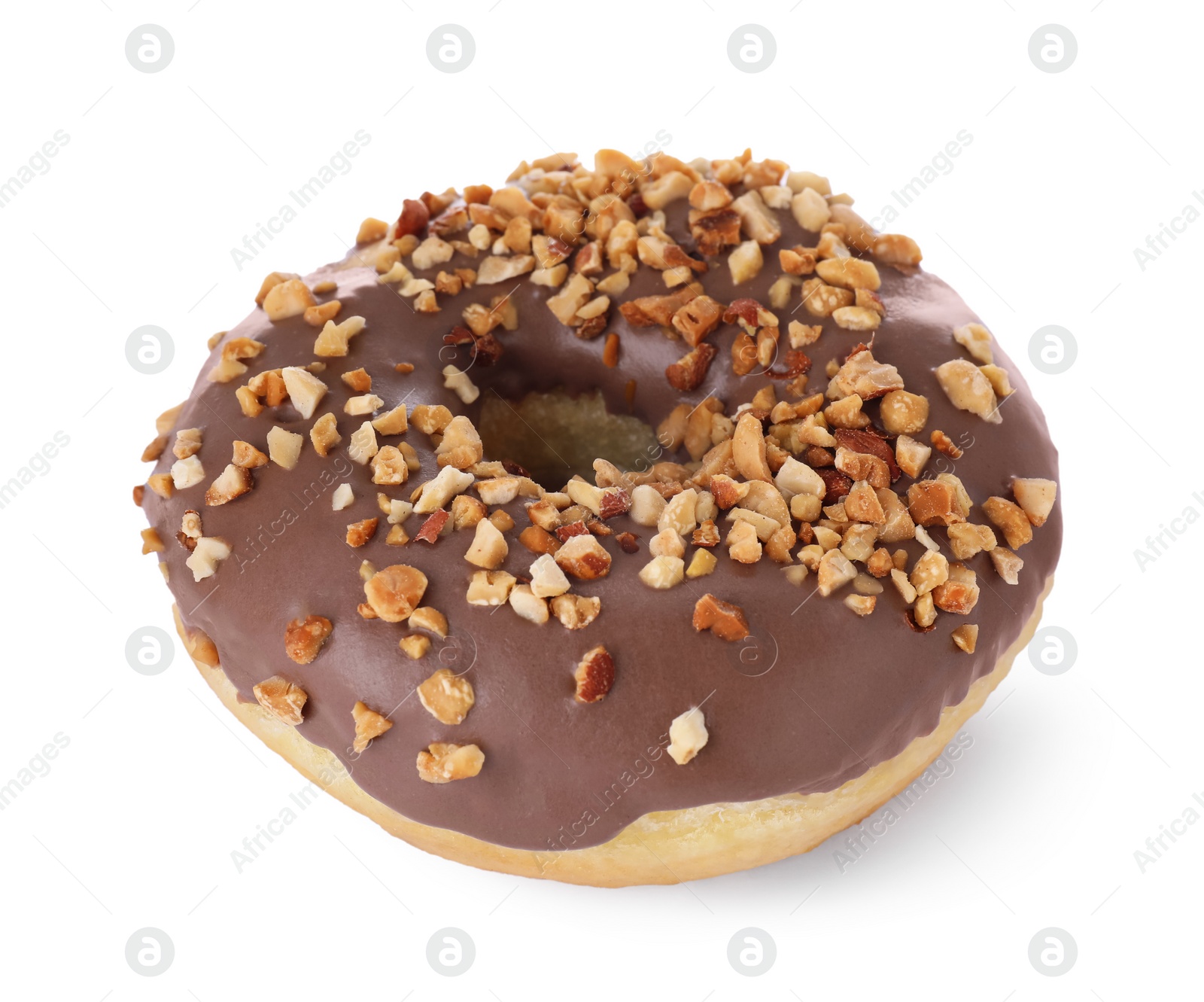 Photo of Tasty glazed donut decorated with nuts isolated on white
