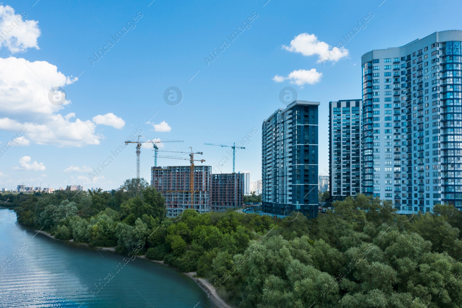 Image of Aerial view of city district on riverside