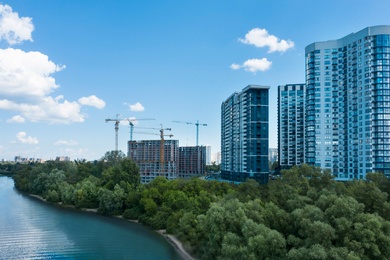 Image of Aerial view of city district on riverside