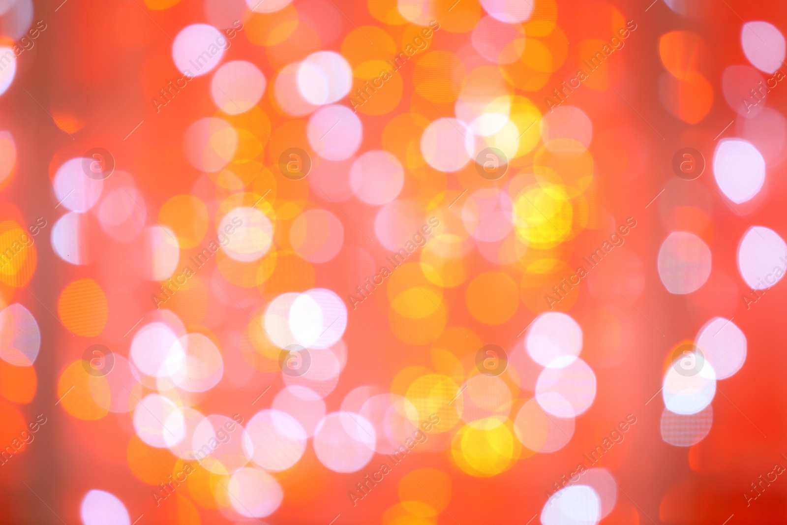 Photo of Blurred view of bright lights as background. Bokeh effect