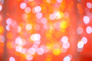 Photo of Blurred view of bright lights as background. Bokeh effect