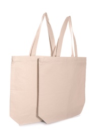 Photo of Eco bags on white background. Mock up for design