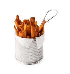 Photo of Delicious sweet potato fries in frying basket isolated on white