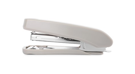 Photo of One new beige stapler isolated on white