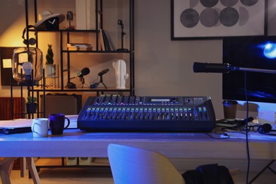 Photo of Professional audio equipment in modern radio studio