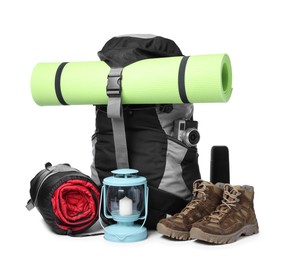 Photo of Set of camping equipment for tourist on white background