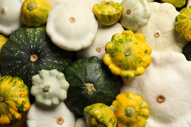 Photo of Fresh ripe pattypan squashes as background, top view