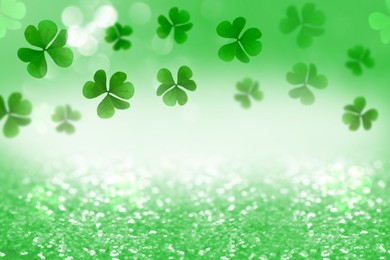 Image of St. Patrick's Day greeting card design with clover leaves, bokeh effect