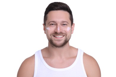 Photo of Handsome man with sun protection cream on his face against white background