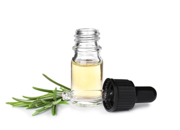 Photo of Little bottle of essential oil with dropper and rosemary on white background
