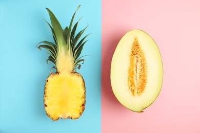 Photo of Flat lay composition with melon and pineapple on color background