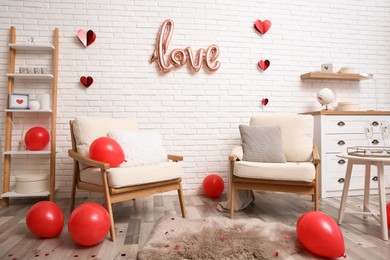 Photo of Cozy living room decorated for Valentine Day. Interior design