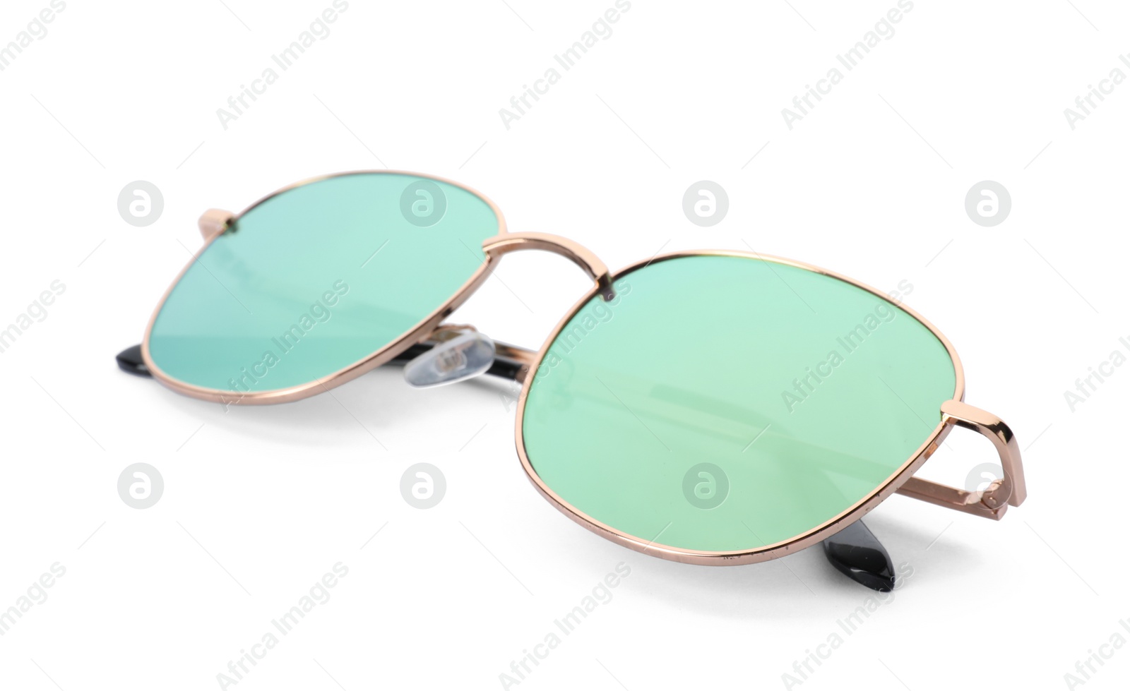 Photo of Beautiful sunglasses on white background. Beach object