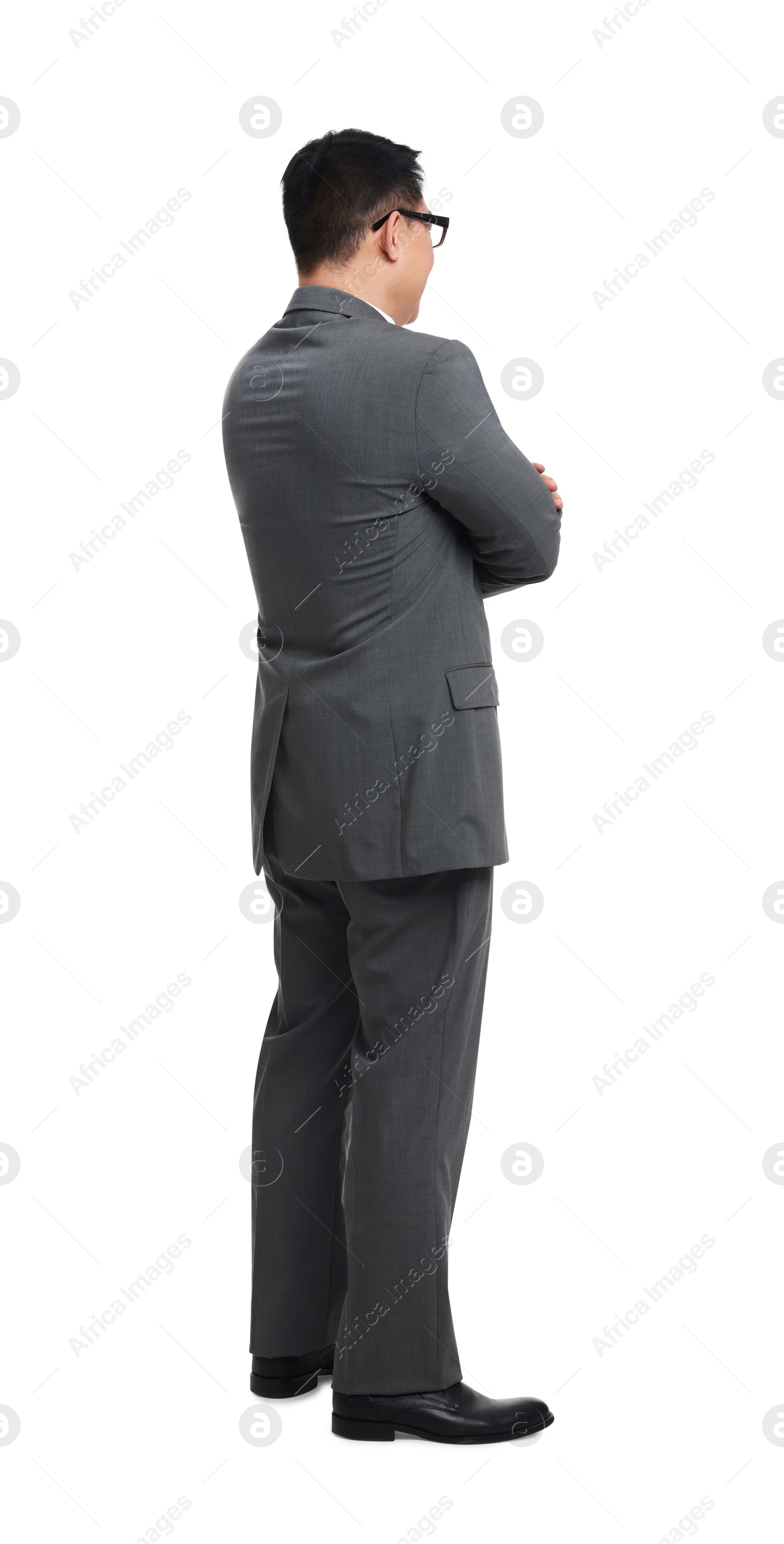 Photo of Businessman in suit wearing glasses on white background